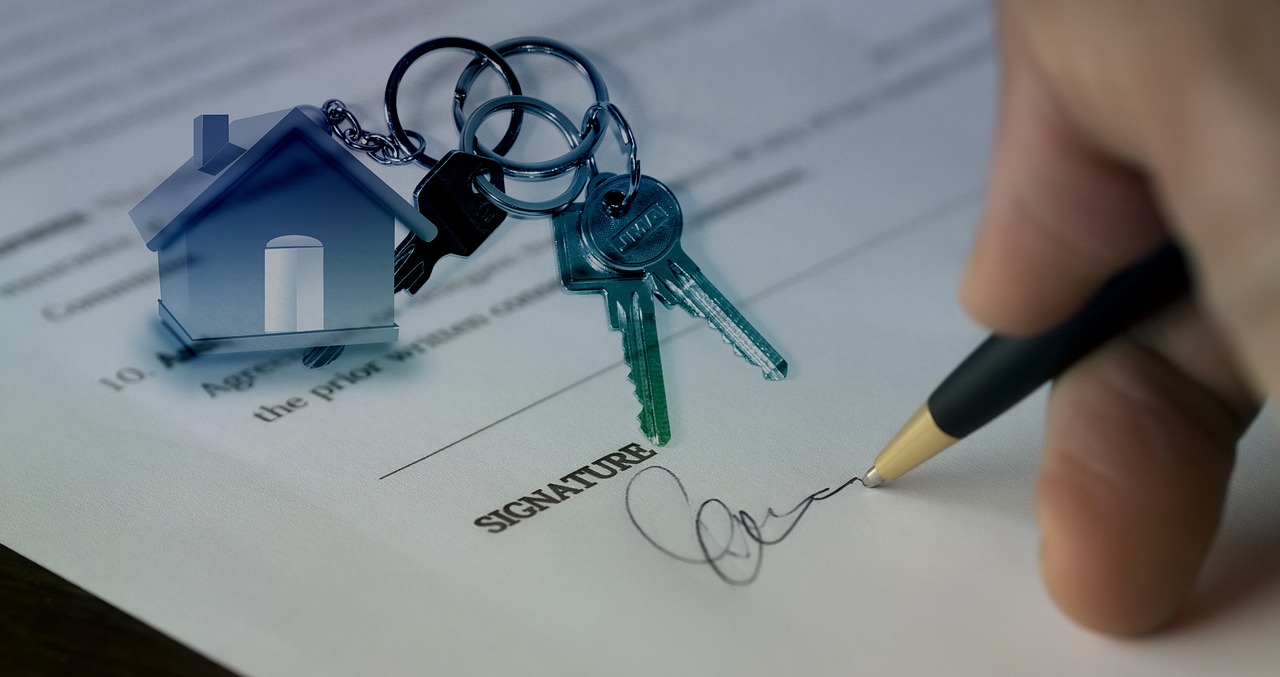 Signing inherited property transfer documents with house keys